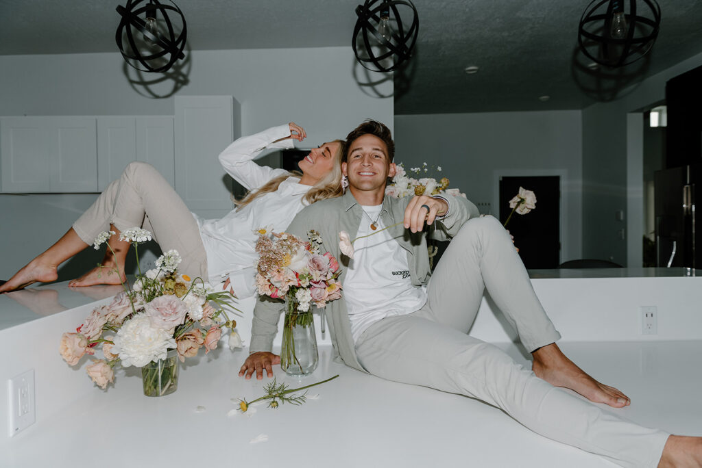 bride and groom hanging out at an airbnb before their elopement day