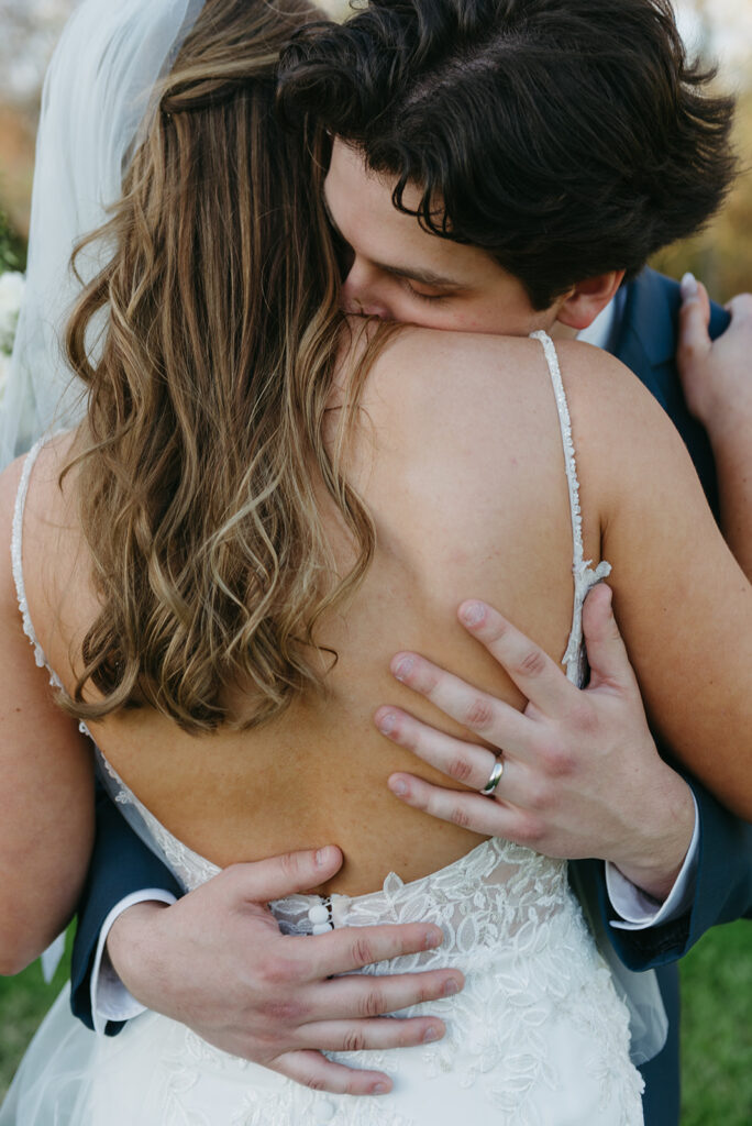 a dreamy bride and groom surrounded by lush green landscapes during their small wedding in loudoun county