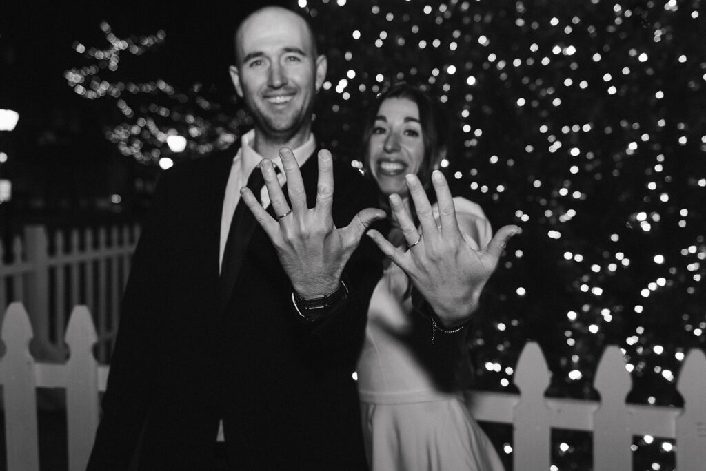 winter elopement ceremony at old town alexandria town square with christmas tree in the background