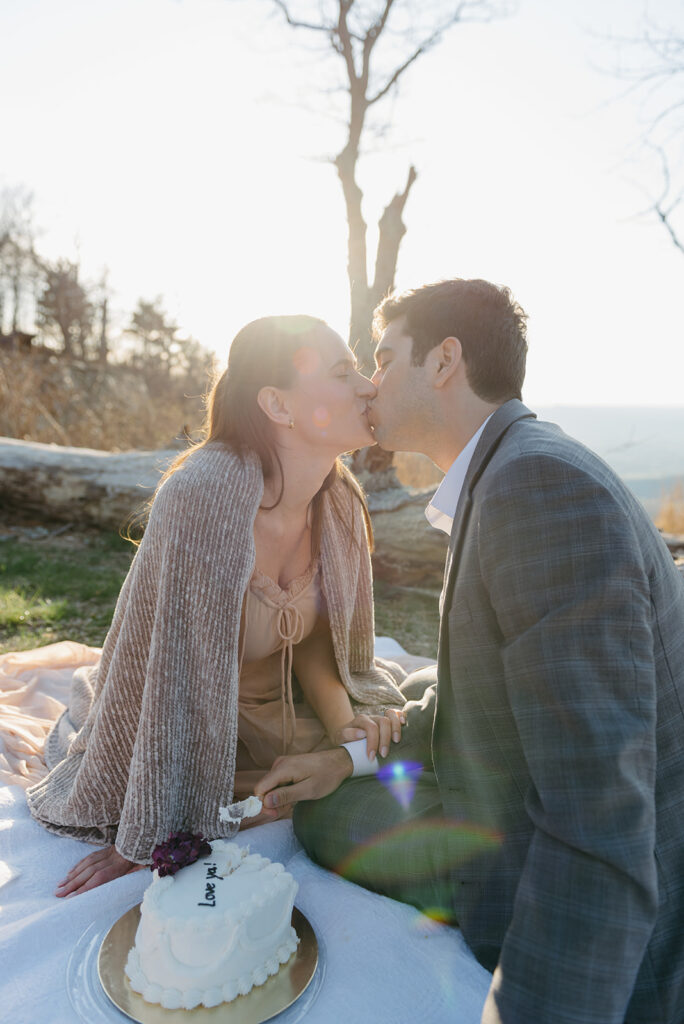 bride and groom cutting their cute elopement cake during their shenandoah national park elopement